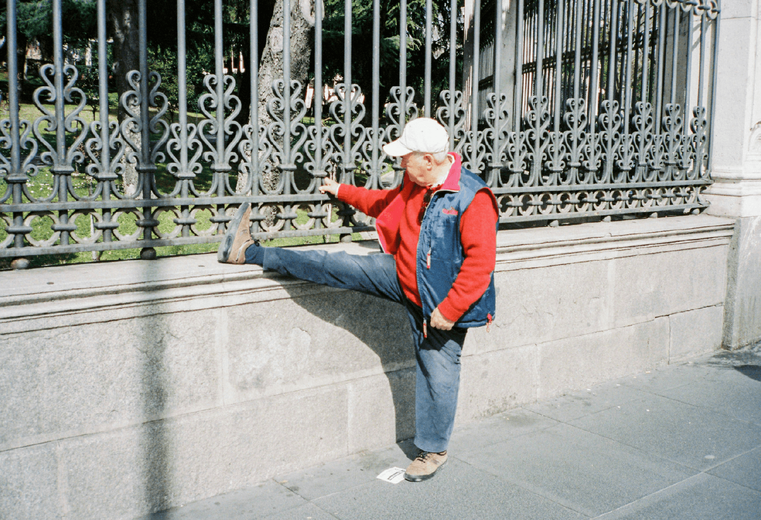 Elderly woman stretching in Barcelona